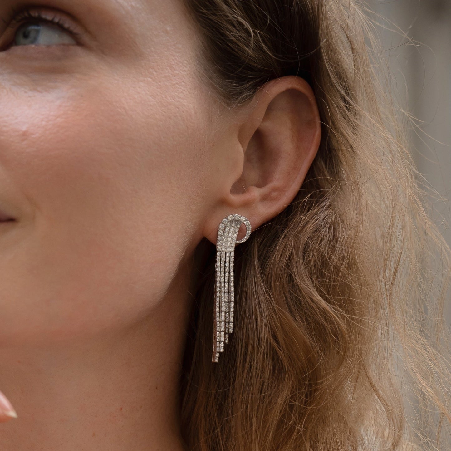 2.02 TCW Round Cut Moissanite Waterfall Danglers Earrings in Gold 1