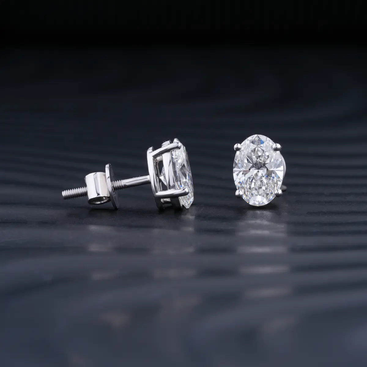 2.0 TCW Oval Cut Moissanite Stud Earrings in Gold 2