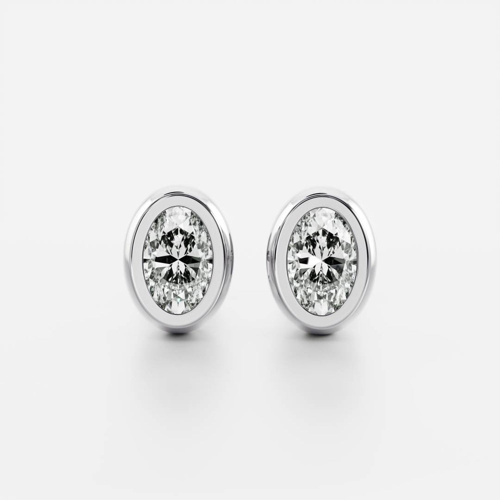 0.50 TCW Oval Cut Moissanite Bezel Stud Earrings in Gold 2