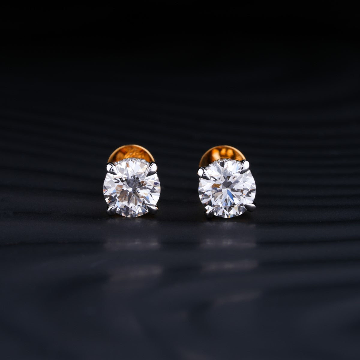 2.0 TCW Round Cut Moissanite Stud Earrings in Gold 1